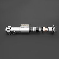 a star wars light saber on a black surface