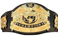 the wwe championship belt is shown on a white background