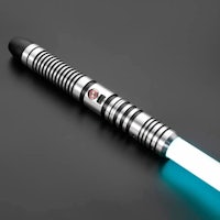 a star wars light saber on a black surface