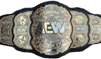 the aew championship belt is shown on a white background
